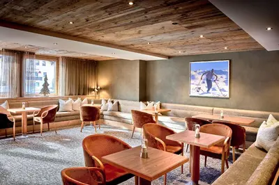 Ein Sitzbereich in der Unterkunft Alpenhotel Perner