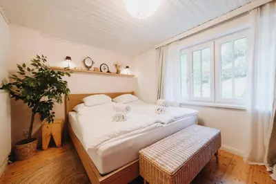 Ein Bett oder Betten in einem Zimmer der Unterkunft Natur & Ruhe - Ferienhaus Alexandra
