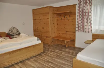 Ein Bett oder Betten in einem Zimmer der Unterkunft Haus Voithofer