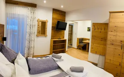 Ein Bett oder Betten in einem Zimmer der Unterkunft Haus Voithofer