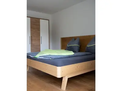Ein Bett oder Betten in einem Zimmer der Unterkunft Apartment Bär Comfortable holiday residence