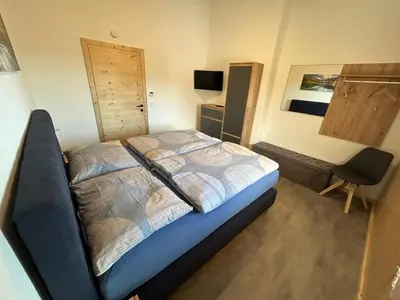 Ein Bett oder Betten in einem Zimmer der Unterkunft Panorama-Apartment Ennstalblick