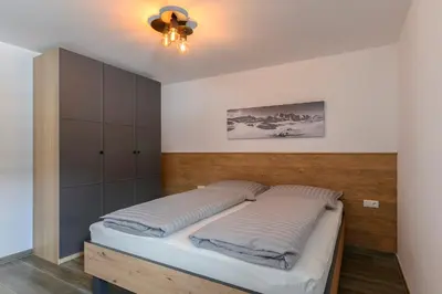 Ein Bett oder Betten in einem Zimmer der Unterkunft Ferienwohnung Klugis