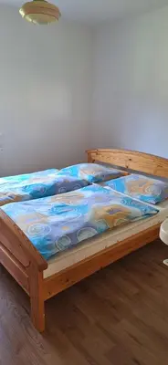 Ein Bett oder Betten in einem Zimmer der Unterkunft Haus Anna & Georg
