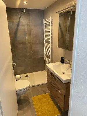 Ein Badezimmer in der Unterkunft Idyllische Suite in Zentrumsnähe mit Parkplatz Top 2