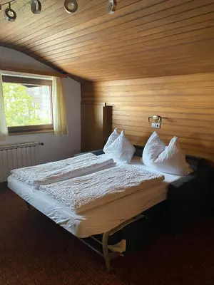 Ein Bett oder Betten in einem Zimmer der Unterkunft Ferienwohnungen Vierthaler
