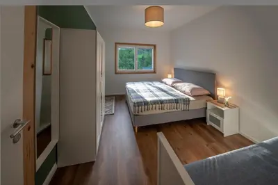 Ein Bett oder Betten in einem Zimmer der Unterkunft Ferienwohnung Spital am Pyhrn