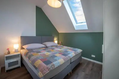 Ein Bett oder Betten in einem Zimmer der Unterkunft Ferienwohnung Spital am Pyhrn