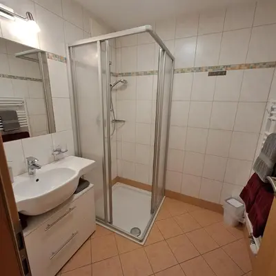 Ein Badezimmer in der Unterkunft Appartements Rabengut
