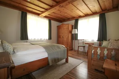 Ein Bett oder Betten in einem Zimmer der Unterkunft Frieda's Platzl