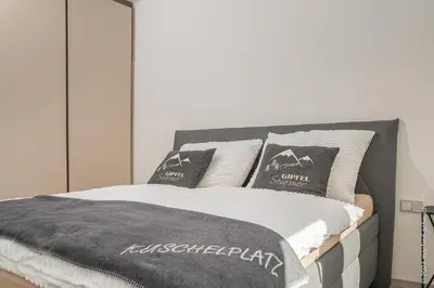 Ein Bett oder Betten in einem Zimmer der Unterkunft Apartment Gamsblick