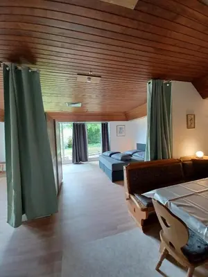 Ein Bett oder Betten in einem Zimmer der Unterkunft Villa Romy - Ferienwohnung