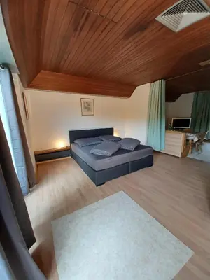 Ein Bett oder Betten in einem Zimmer der Unterkunft Villa Romy - Ferienwohnung