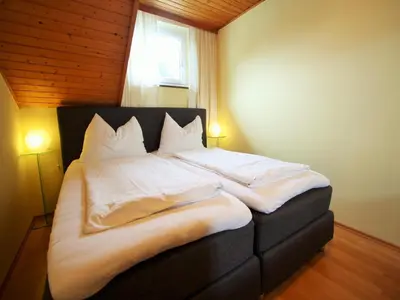 Ein Bett oder Betten in einem Zimmer der Unterkunft Scenic Apartment in Krispl Salzburg with Swimming Pool