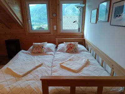 Ein Bett oder Betten in einem Zimmer der Unterkunft Ferienwohnung Ardning