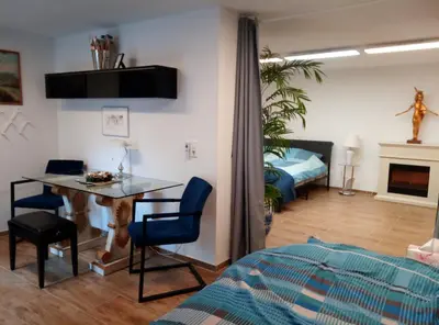 Ein Bett oder Betten in einem Zimmer der Unterkunft FeApp Souterrain Pennen & Parken