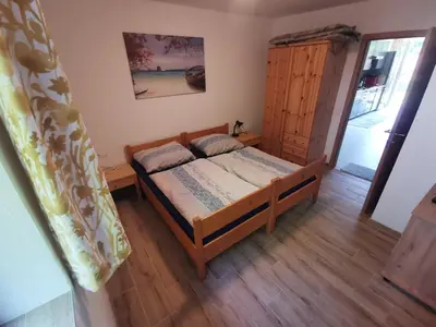 Ein Bett oder Betten in einem Zimmer der Unterkunft Ferienwohnungen Steinbichl