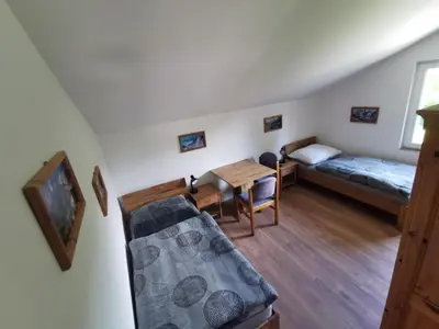 Ein Bett oder Betten in einem Zimmer der Unterkunft Ferienwohnungen Steinbichl