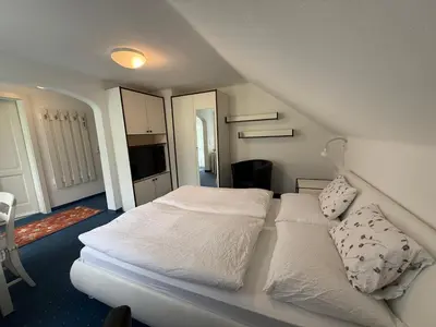 Ein Bett oder Betten in einem Zimmer der Unterkunft Boutique Studio - Apartment mit Bergblick und Balkon - inklusive Sommercard!