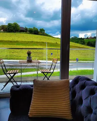 Ein Sitzbereich in der Unterkunft Noor Lux Apartments