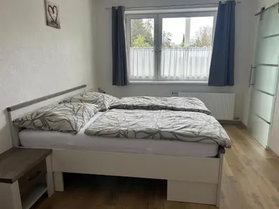 Ein Bett oder Betten in einem Zimmer der Unterkunft Apartment Attergautraum 1