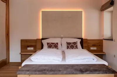 Ein Bett oder Betten in einem Zimmer der Unterkunft Biohof Greflgut
