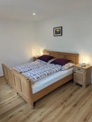 Ein Bett oder Betten in einem Zimmer der Unterkunft Seehaus Miglbauer