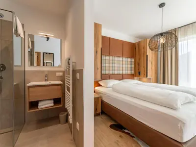Ein Bett oder Betten in einem Zimmer der Unterkunft Grebenzen Lodge 51