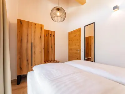 Ein Bett oder Betten in einem Zimmer der Unterkunft Grebenzen Lodge 51B