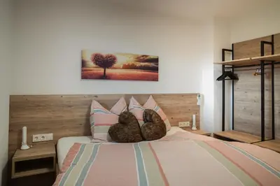 Ein Bett oder Betten in einem Zimmer der Unterkunft Miglurahof