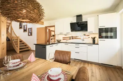 Küche/Küchenzeile in der Unterkunft Pistenblick Lodge