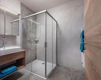 Ein Badezimmer in der Unterkunft T-Lodge Zauchensee