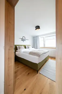 Ein Bett oder Betten in einem Zimmer der Unterkunft Ferienwohnung Silvia, Mondsee Zentrum