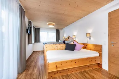Ein Bett oder Betten in einem Zimmer der Unterkunft d'Hoamatliab