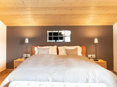 Ein Bett oder Betten in einem Zimmer der Unterkunft Katschberg 8