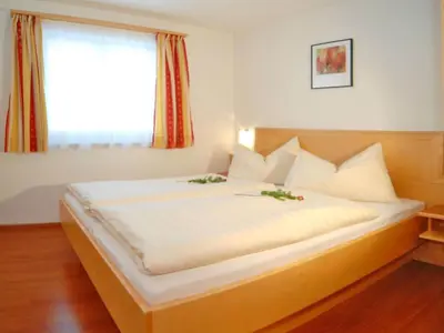 Ein Bett oder Betten in einem Zimmer der Unterkunft Apartment Dahoam-1 by Interhome