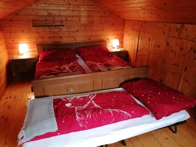 Ein Bett oder Betten in einem Zimmer der Unterkunft Stoderhütte