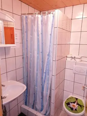 Ein Badezimmer in der Unterkunft Stoderhütte
