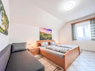Ein Bett oder Betten in einem Zimmer der Unterkunft Holiday Home LuxuSölk-5 by Interhome
