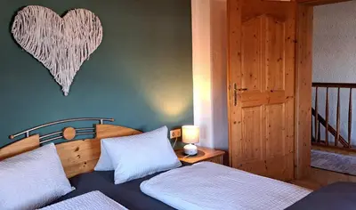 Ein Bett oder Betten in einem Zimmer der Unterkunft Panorama Chalet mit Sauna Höllmaishof