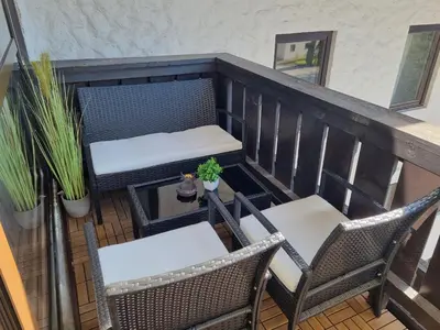 Ein Sitzbereich in der Unterkunft Apartment Cow Royal