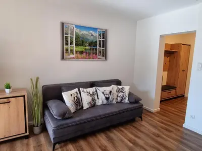 Ein Sitzbereich in der Unterkunft Apartment Cow Royal