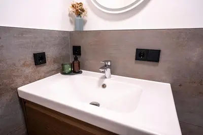Ein Badezimmer in der Unterkunft Suite Apartment modern getaway - Neu renoviert - Strobl am Wolfgangsee