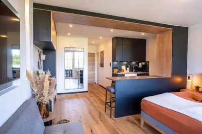 Ein Bett oder Betten in einem Zimmer der Unterkunft Suite Apartment modern getaway - Neu renoviert - Strobl am Wolfgangsee