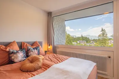 Ein Bett oder Betten in einem Zimmer der Unterkunft Suite Apartment modern getaway - Neu renoviert - Strobl am Wolfgangsee