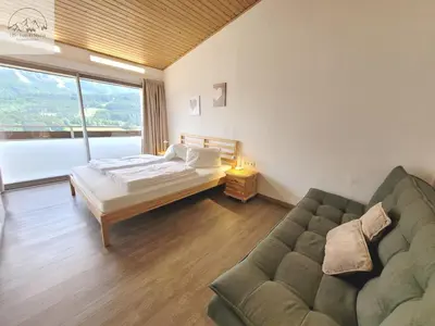 Ein Bett oder Betten in einem Zimmer der Unterkunft Apartment Panoramablick Tauplitz