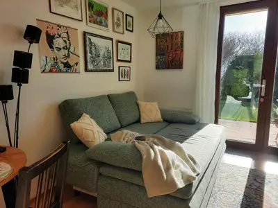 Ein Sitzbereich in der Unterkunft Gallery - Terrasse mit Seeblick und Garten