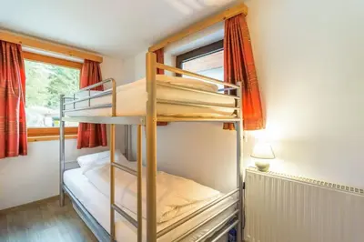 Ein Bett oder Betten in einem Zimmer der Unterkunft Chalet Mariapfarr