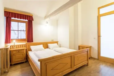 Ein Bett oder Betten in einem Zimmer der Unterkunft Chalet Mariapfarr