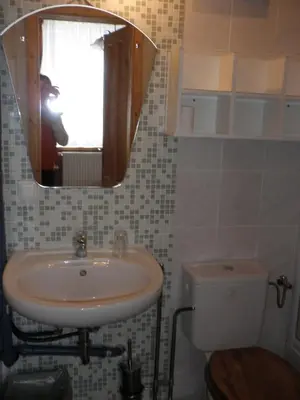 Ein Badezimmer in der Unterkunft Alpenpension